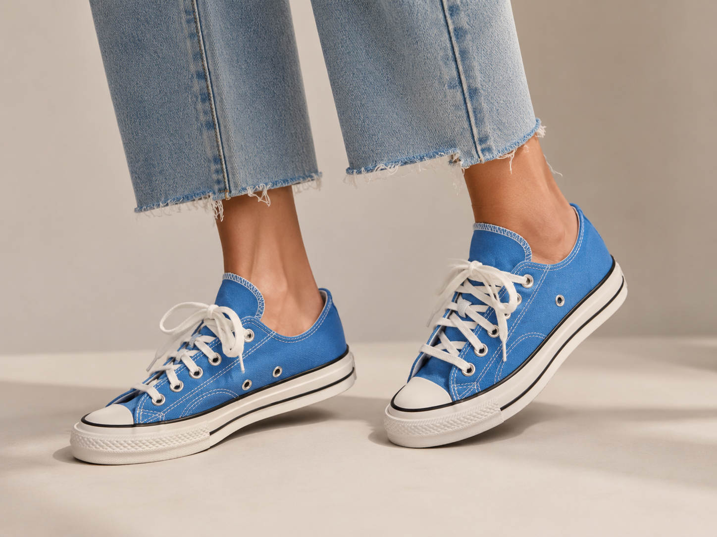Converse Chuck 70 OX portée style streetwear unisexe par femme