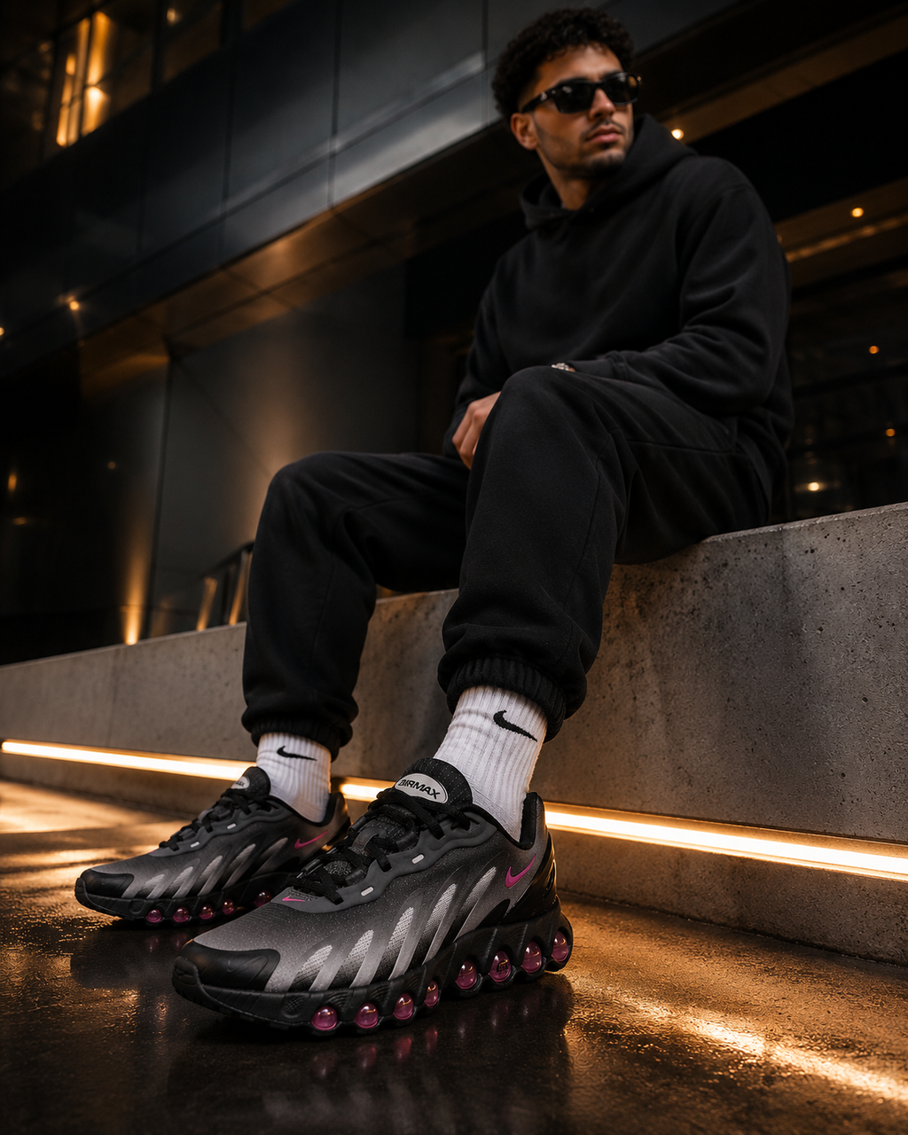 Nike Air Max DN8 IH4119-004 Homme portée en environnement urbain premium de nuit